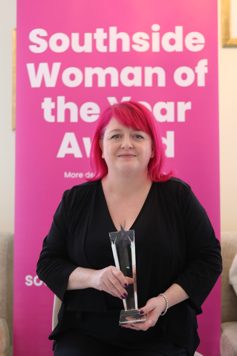 Jo Kinsella with her award.jpg